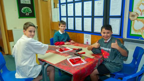 Children printing in an art lesson